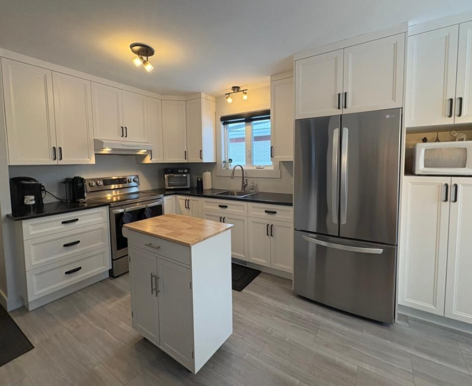 5 1/2 1er étage complet d'un duplex de 2 logements a Lévis-Lauzon ( Chauffé/Climatisé ) | 3235635