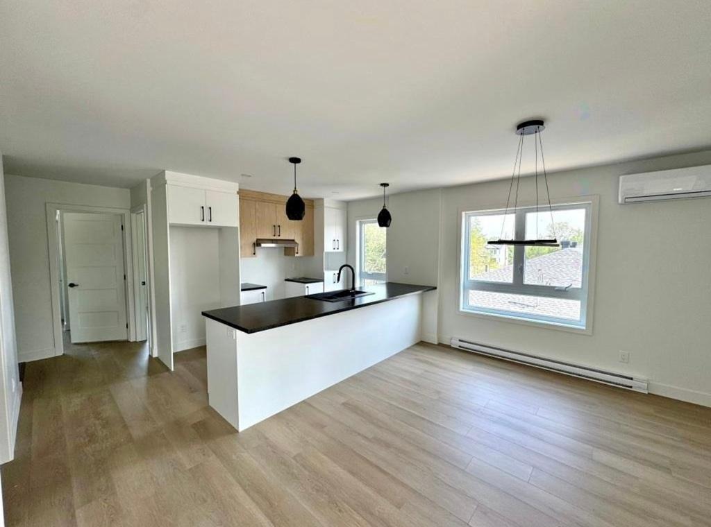 Logement 4 1/2 | 3240852