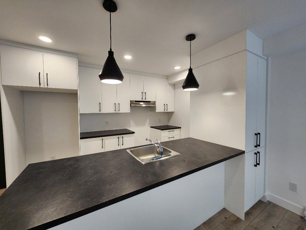 PROMOTION- NOUVEAU **3 1/2** + espace Bureau au CŒUR de STE-FOY | 3307592