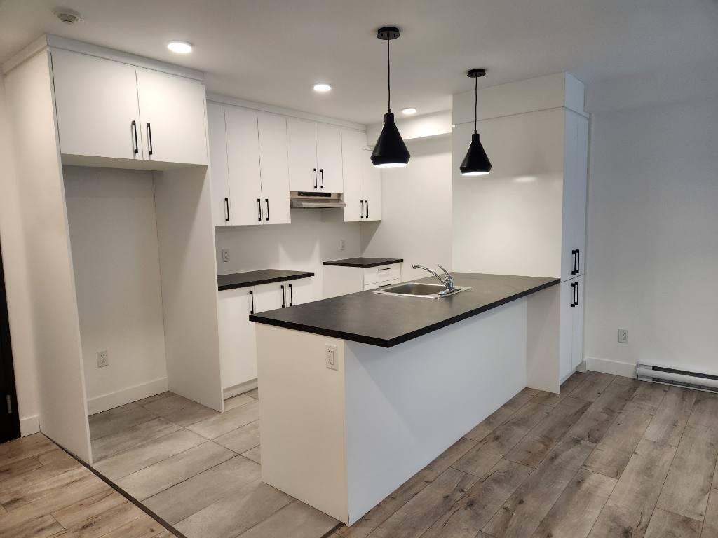 PROMOTION- NOUVEAU **3 1/2** + espace Bureau au CŒUR de STE-FOY | 3307592