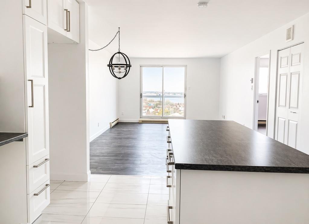 Condo 3½ avec vue fleuve + Château Frontenac | Stationnement intérieur | Lévis | 3279121