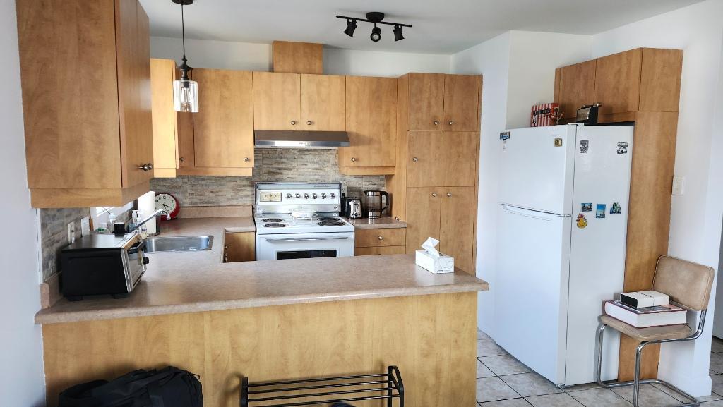 Appartement de 3 chambres sur 2 étages avec garage double | 3278112