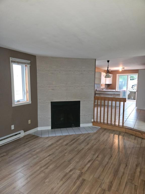 Un grand lumineux 4 1/2 sur un triplex à louer | 3279978