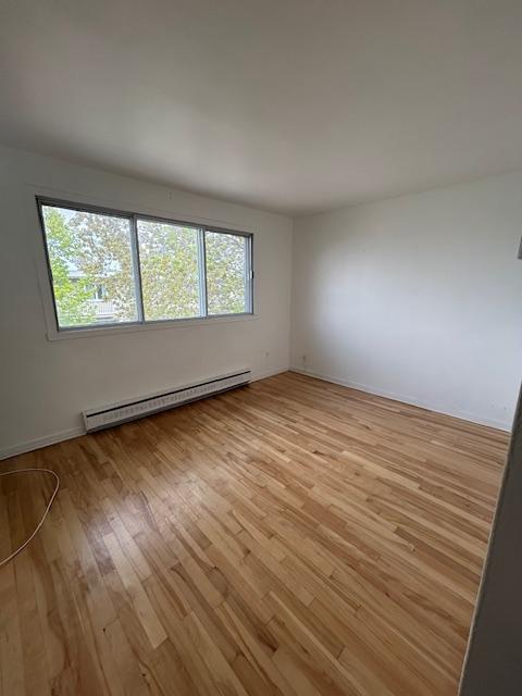 Anjou 4 1/2 rénové, haut de triplex détaché | 3282691