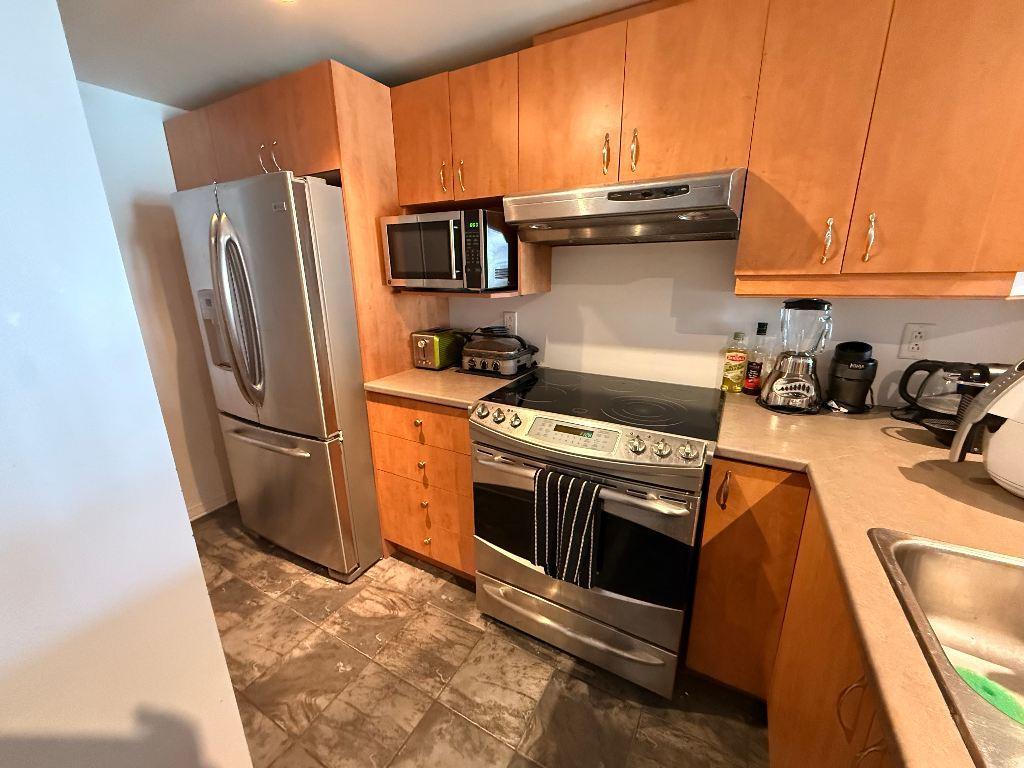 Appartement grand 3 1/2 centre-ville | 3282773