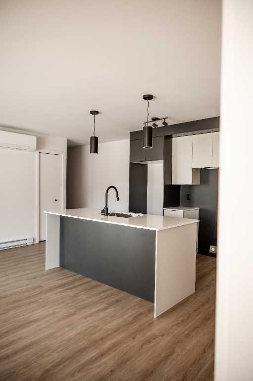 Superbe 4 1/2 dans un bâtiment neuf | 3278619