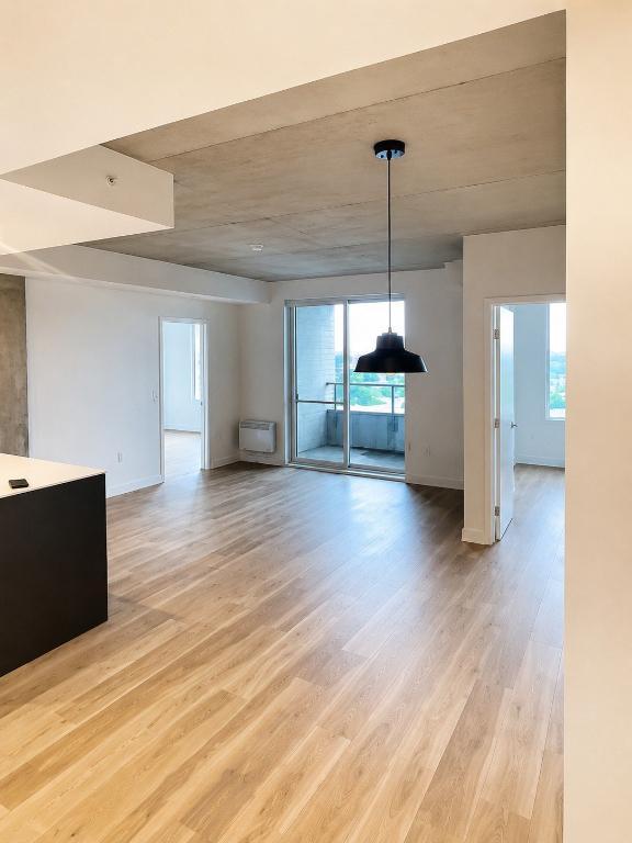 Condo locatif — 4½ neuf, jamais habité — Piscine sur le toit — Au pied du métro Cartier, Laval | 3290746