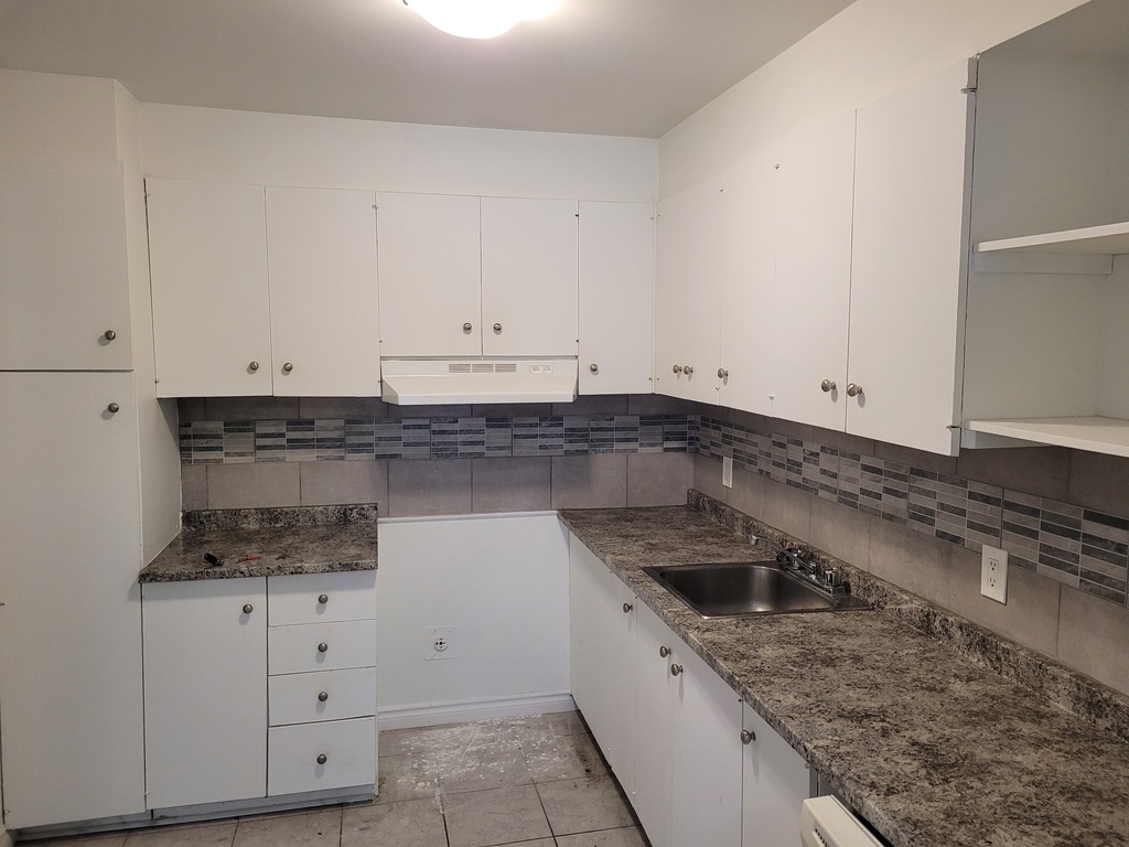 Beau 4 1/2 Situé Au Rez-de-jardin | 3297945