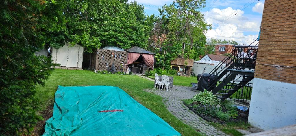 Grand 5 1/2 au RDC d'un triplex avec cour arriere | 3292810