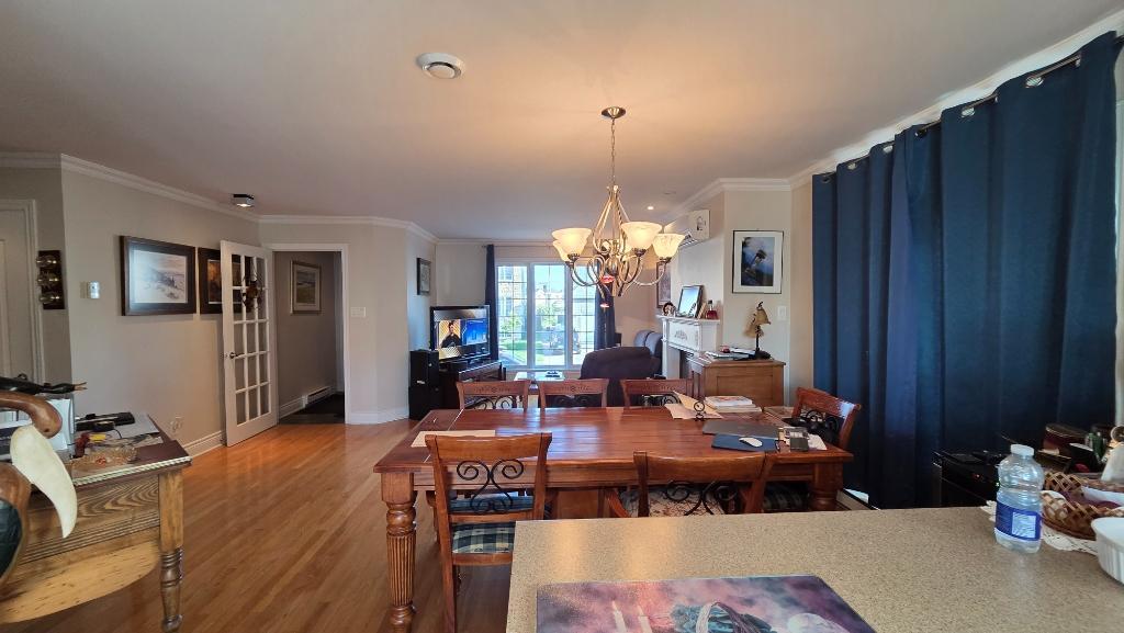 Carrefour Laval très jolie et grand 4 ½ de style condo, situé au 1er étage d’un triplex | 3297417