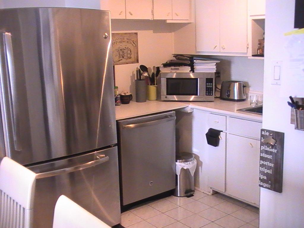 4 1/2 Vieux Longueuil style condo à louer - Béton - Garage | 3297548