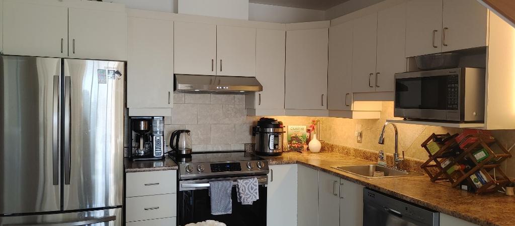Condo à louer – LeMoyne (Longueuil) | 3½ avec mezzanine, garage intérieur | 1 875 $/mois | 3298055