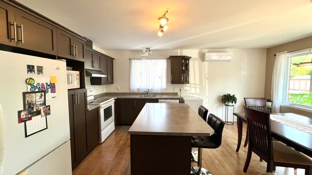 grand 4 1/2 St-Hubert, accès ascenseur, vue sur boisé | 3311509