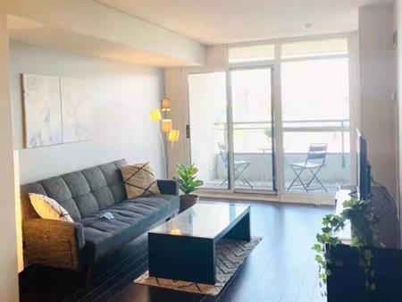 Furnished Condo Rental - Spacious 1 Bed + Den, City Views