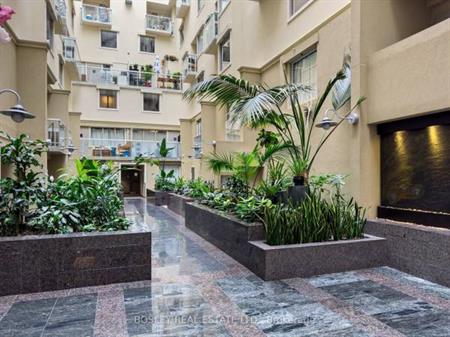 dramatic balcony/ work-from-home space overlooking the buildings