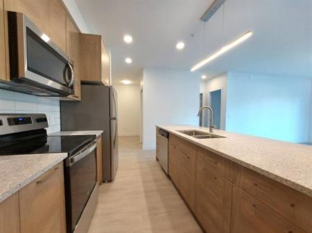 Luxury 2 Bedroom + Den includes parking, A/C, gym, wrap around balcony