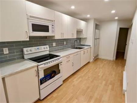 Bright, clean and spacious 2 bed, 1 bath GROUND LEVEL suite