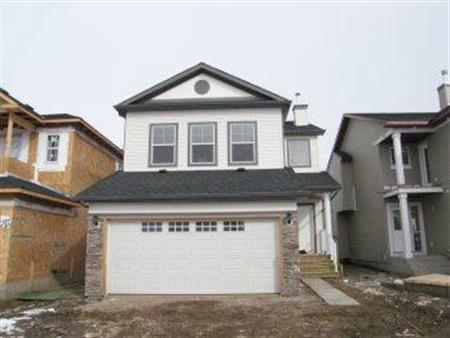 TWO STOREY -3 BEDROOMS, 2.5 BATH, BONUS ROON ,FRONT ATTACHED DOUBLE CAR  GARAGE | 164 Taalake Cres,NE, Calgary