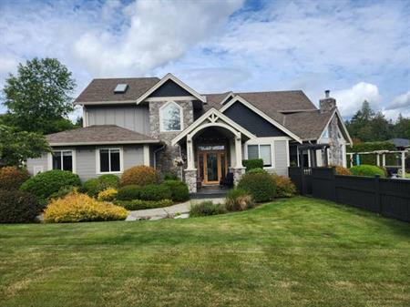 Exclusive Mill Bay Residence: 4-Bedroom Home with Ample Amenities