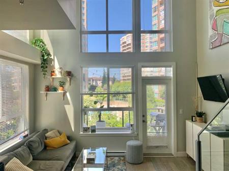 Beautiful 2 bed 2 bath corner unit loft with 2 story windows