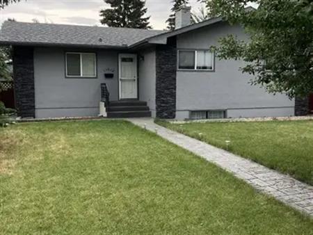 Newly renovated 3 BR fully furnished bungalow in Braeside SW | 11012 Braton Place SW, Calgary