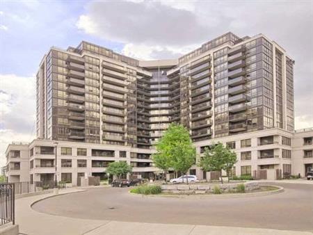 Bright & Spacious Condo -- One Bedroom plus Den -- 740 sq.