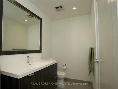 Feels brand new + den high ceilings parking included!