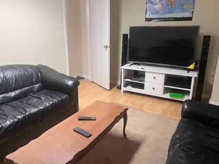 A furnished room for student to share with a student family near UBC