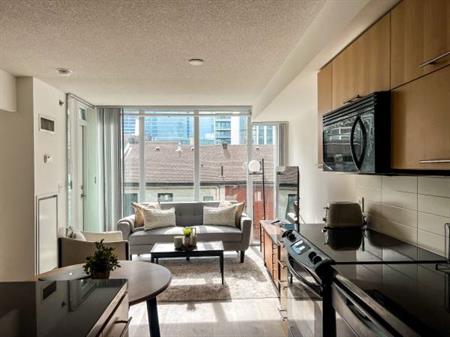 Spacious 2 Bed, 2 Bath in Queen West with Balcony and King Sized Prima