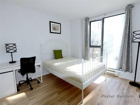 master bedroom in a sharded apartment unit in Lansdowne