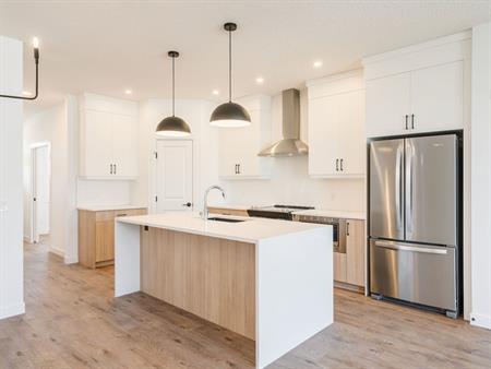 Brand New Detached Home Fronting onto Green Space | Calgary