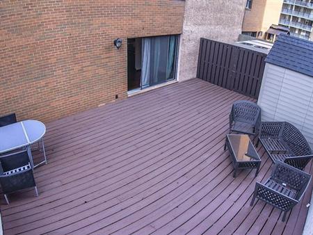 Corner unit with a HUGE patio | 207 - 718 12 Ave SW, Calgary