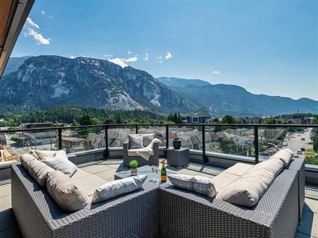 Modern 1-Bedroom + Den Condo with Spectacular Mountain Views