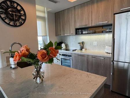 Parklawn & Lakeshore Luxurious 2Bdrm High Floor Upgraded Corner Unit