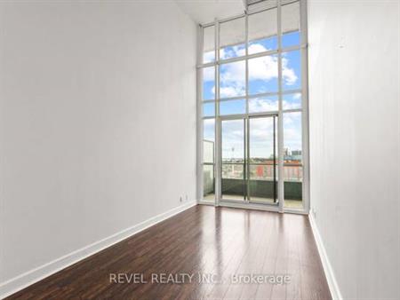 High ceilings parking included floor to ceiling windows!