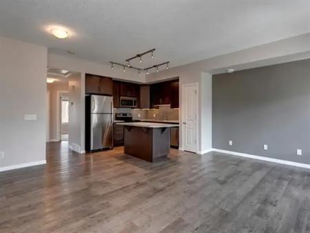 Townhouse with Garage & Balcony Overlooking Garden! | Calgary