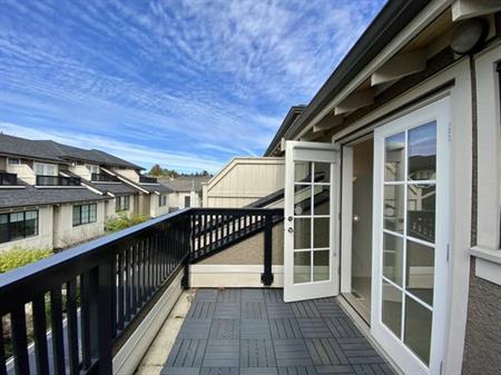 Spacious Functional Townhouse in Marpole with views and great schools!