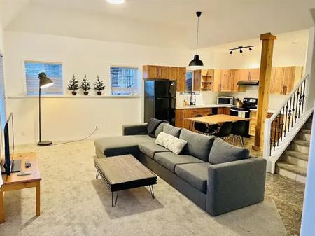 Just renovated! Furnished walk-out, mtn views, hot tub, 12ft ceilings! | Crowsnest Pass