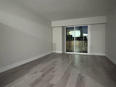 UPDATED 2 bdrm, 1 bath UPPER level APARTMENT with OWN laundry/sundeck