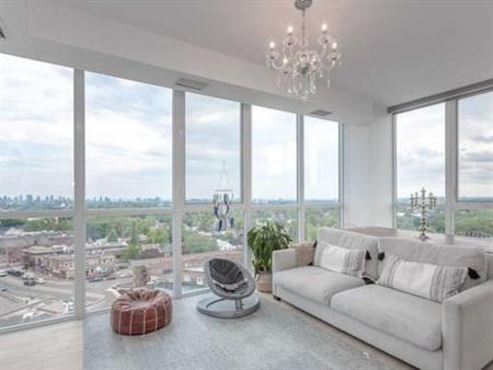 ELEVATE YOUR LIFE WITH THIS 2+1 BDRM CONDO AT ST CLAIR AND BATHURST!