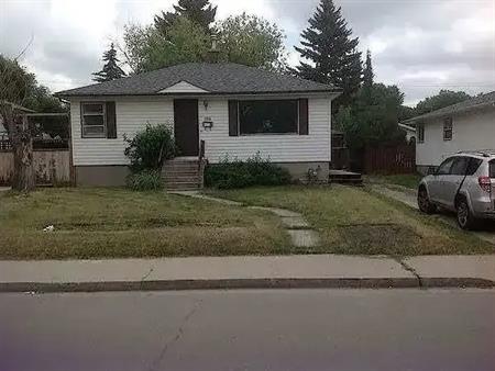 fantastic location update mainfloor-2bed&Garage  in Highland Park | 3916 3 Street Northwest, Calgary