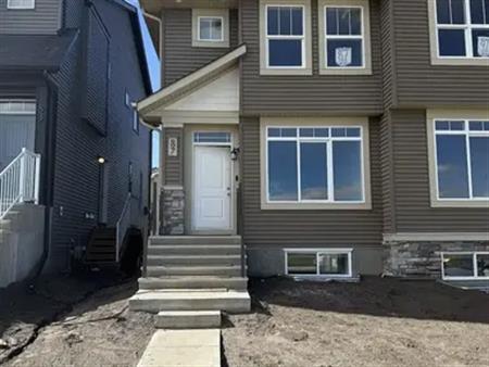 NEW 3 BEDROOM DUPLEX IN GLACIER RIDGE | 87 Edith Pass Northwest, Calgary