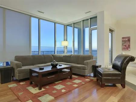 PENTHOUSE MOUNTAIN AND CITY VIEWS!  FURNISHED!  2 INDOOR PARKING STALLS! | 1410 1 St SE, Calgary