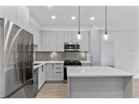 BRAND NEW 2 BEDROOM 2 BATH CONDO - TOP FLOOR!! KING & CRESCENT