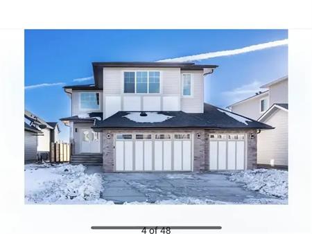 4 bedroom 4 washroom detached triple front garage home | Langdon