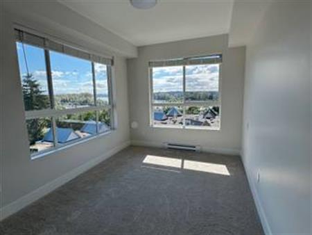 Brand new top floor corner unit