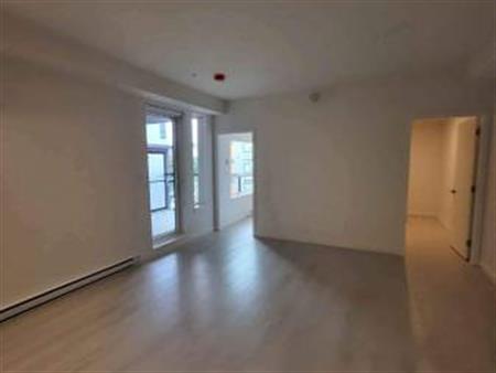 Brand new 2bed + DEN unit at Surrey Central