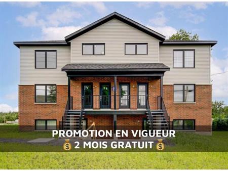 **PROMO 2 mois gratuits!**Beau 41/2 neuf, vue sur un Verger, internet inclus ! LIBRE IMMÉDIATEMENT