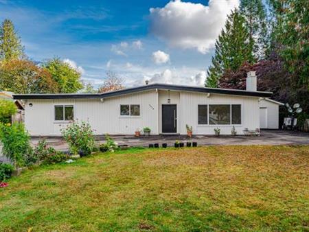 four-bedroom 2.5 bath rancher style home