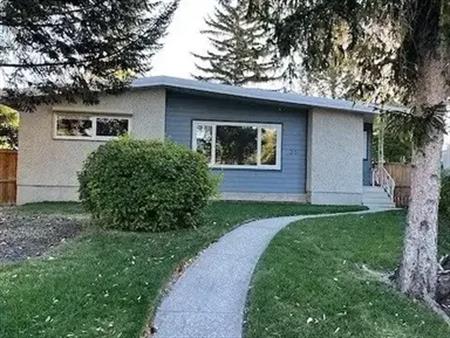 Charming 3 bedroom home, with private fenced yard and detached double garage | 21 Langton Drive Southwest, Calgary